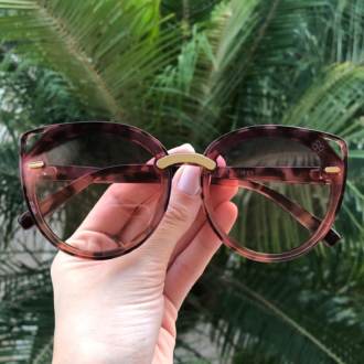 saline.com.br oculos de sol ema rosa com oncinha 3