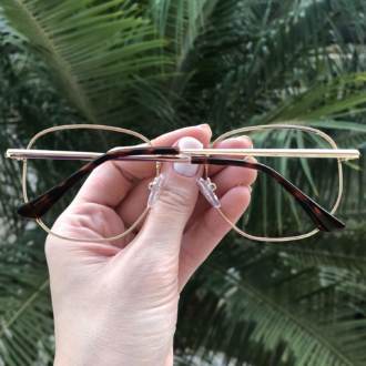 safine com br oculos de grau hexagonal dourado lais 1