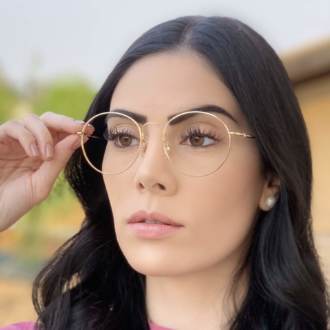 safine com br oculos de grau redondo titanio dourado 1