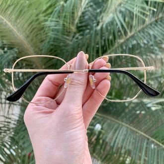 safine com br oculos de grau hexagonal dourado e preto lali 1